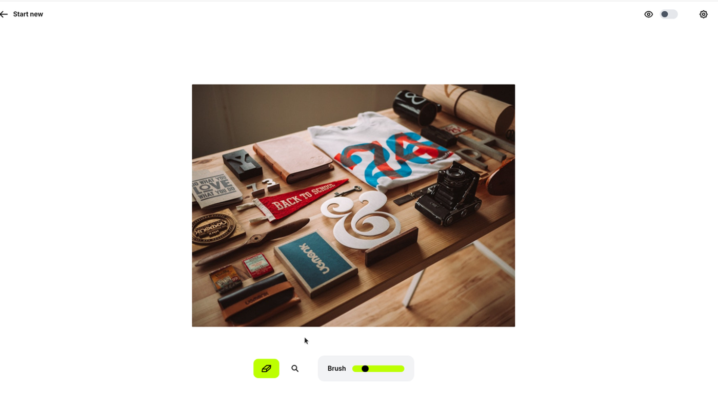 Cleanup.pictures brush editor with a desk photo and Brush slider